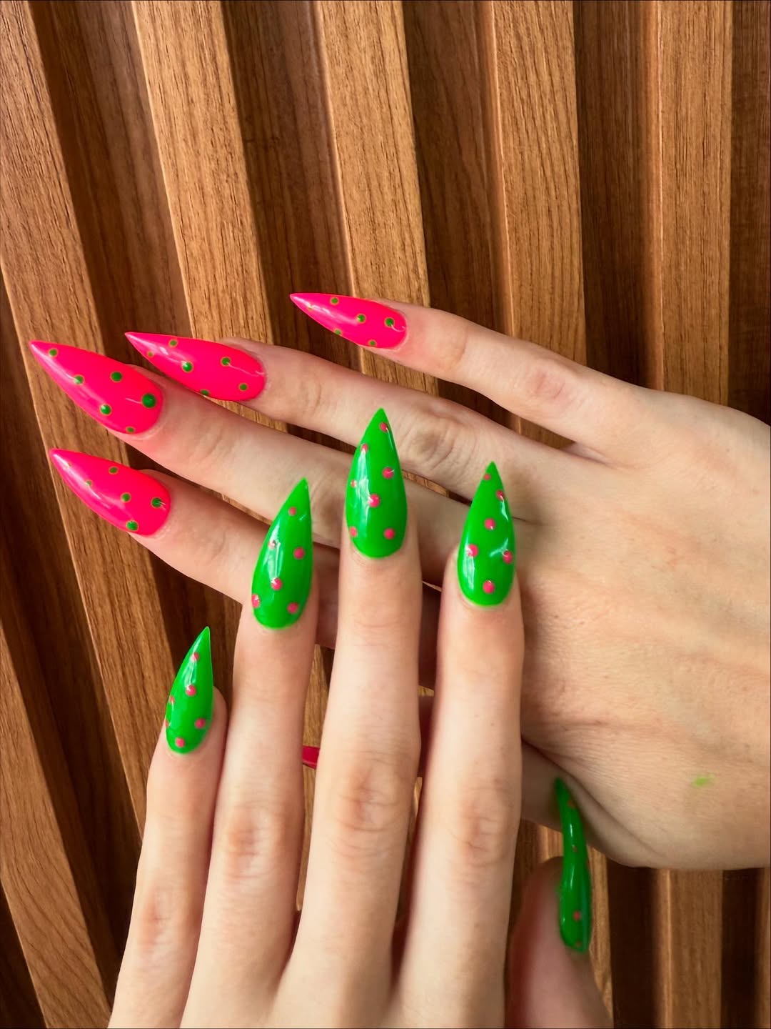 Vibrant pink and green nail art